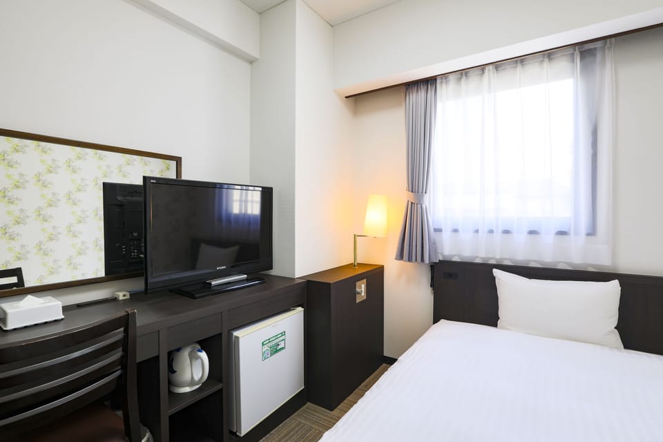 Desk, blackout drapes, iron/ironing board, free WiFi