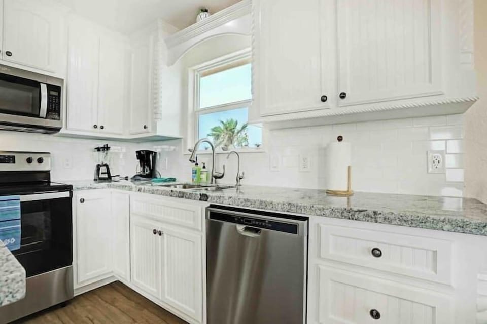 Custom granite counter tops. Coffee maker and blender included