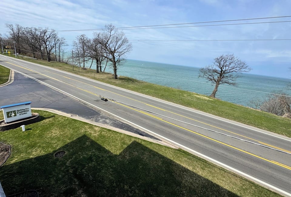 Suite, 1 King Bed, Lake View | Desk, laptop workspace, iron/ironing board, free WiFi