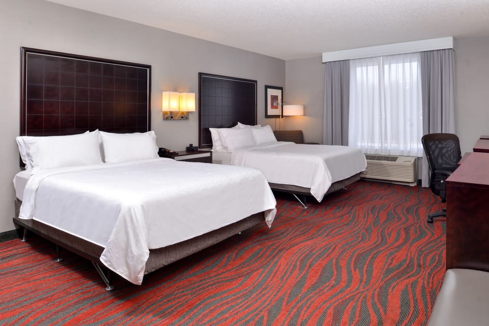 In-room safe, desk, iron/ironing board, free cribs/infant beds