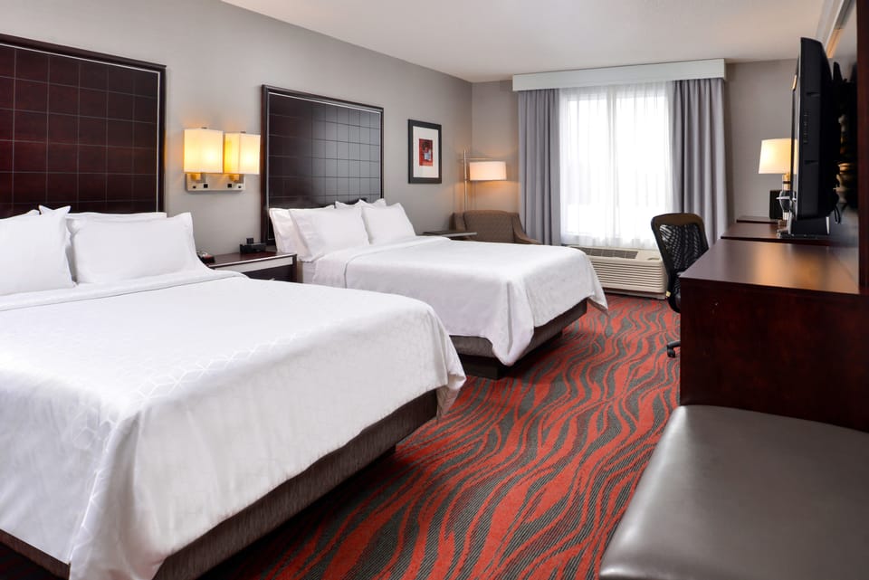 In-room safe, desk, iron/ironing board, free cribs/infant beds