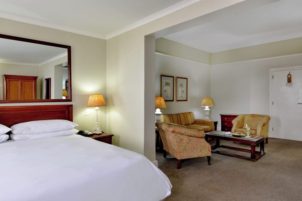 Executive King Room, 1 Bedroom, Sea Facing | Minibar, in-room safe, desk, laptop workspace