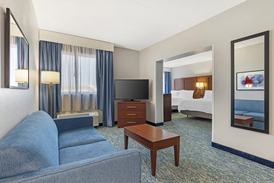 Suite, 2 Queen Beds | Desk, blackout drapes, soundproofing, iron/ironing board