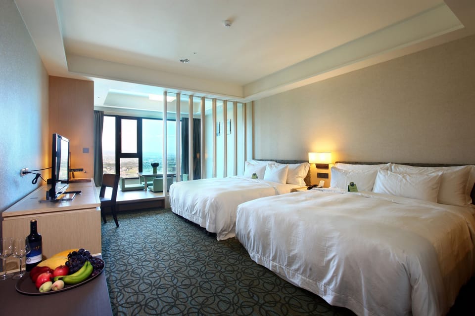 Down comforters, free minibar, in-room safe, desk