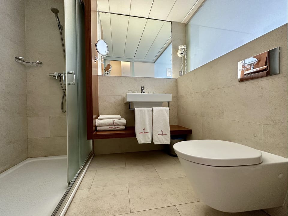 Triple Room | Bathroom | Hair dryer, towels, soap, shampoo