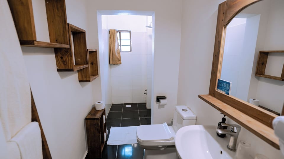 Standard Family Room | Bathroom | Shower, free toiletries, hair dryer, towels