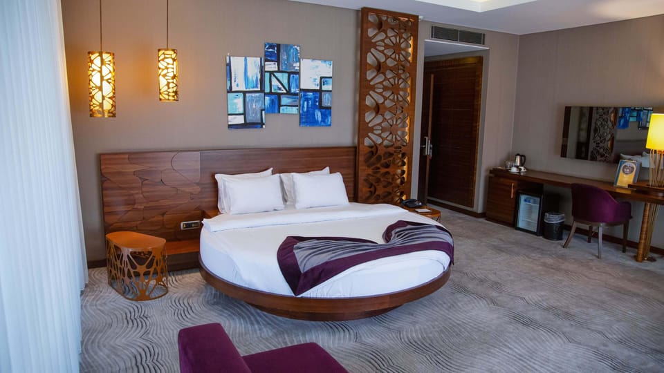 Family Room | Premium bedding, minibar, in-room safe, individually decorated