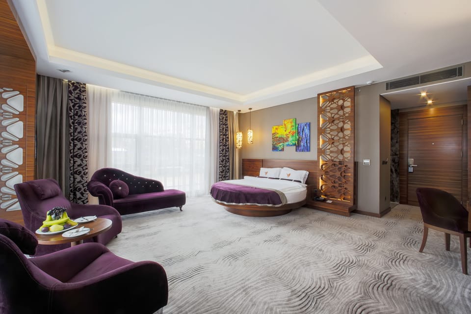 Family Room | Premium bedding, minibar, in-room safe, individually decorated