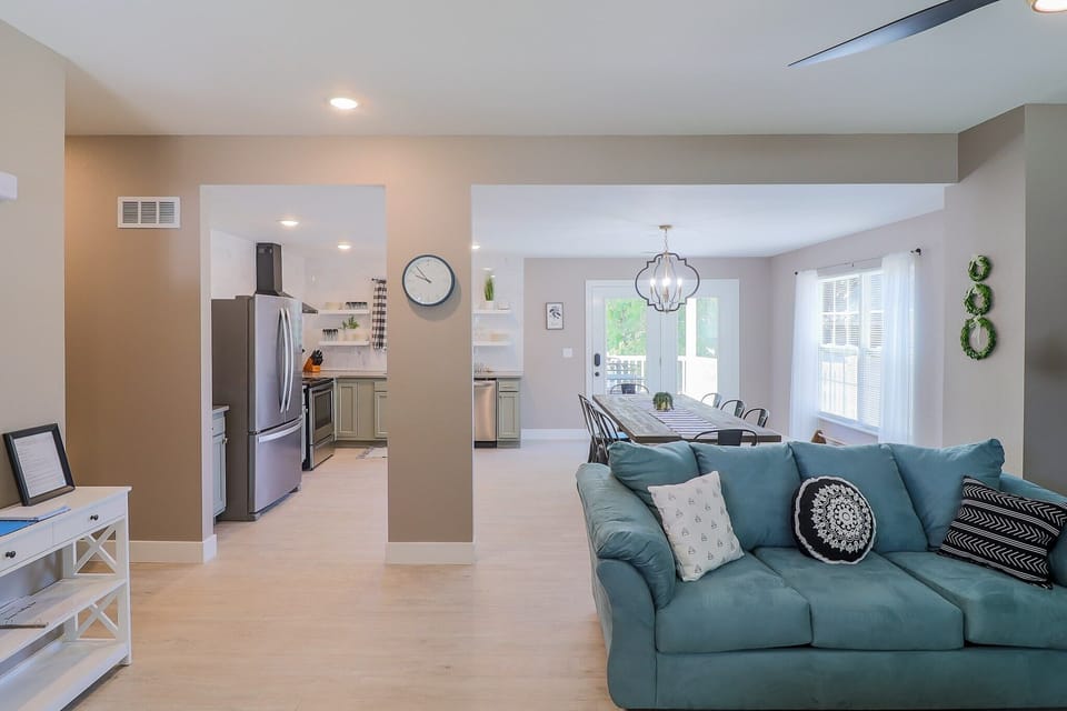 View when you walk in front door. Couch shown is a sleeper sofa. 