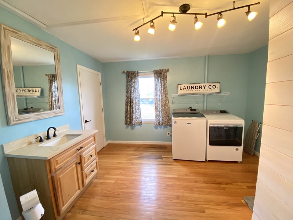 Bathroom 3 includes shower and washer/dryer available for guest use.