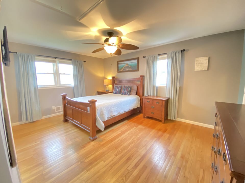 Master Bedroom with Queen Bed and Firestick TV. Includes attached master bath