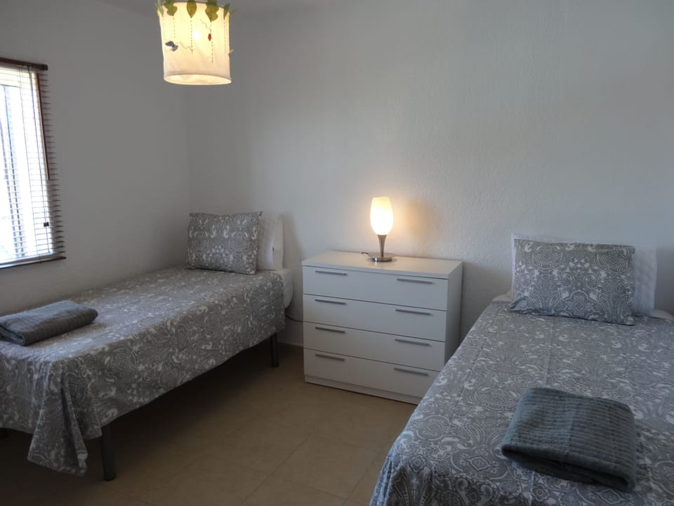 Twin bedroom with a/c