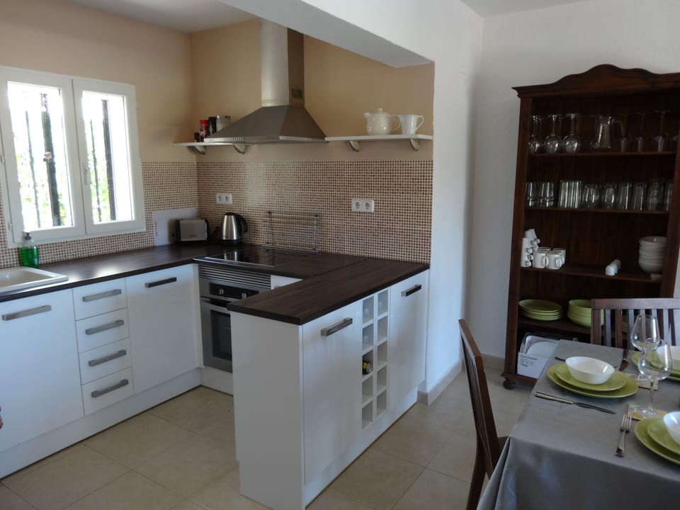 Well equipped kitchen with dishwasher, fridge freezer, microwave, oven, hob.