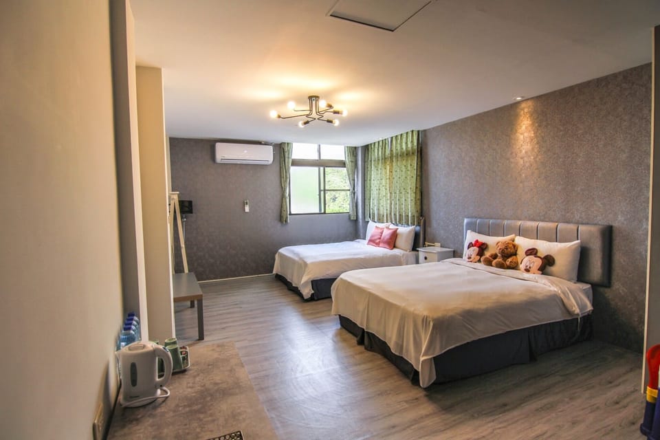 Family Quadruple Room, 2 Double Beds | 12 bedrooms, down comforters, blackout drapes, rollaway beds