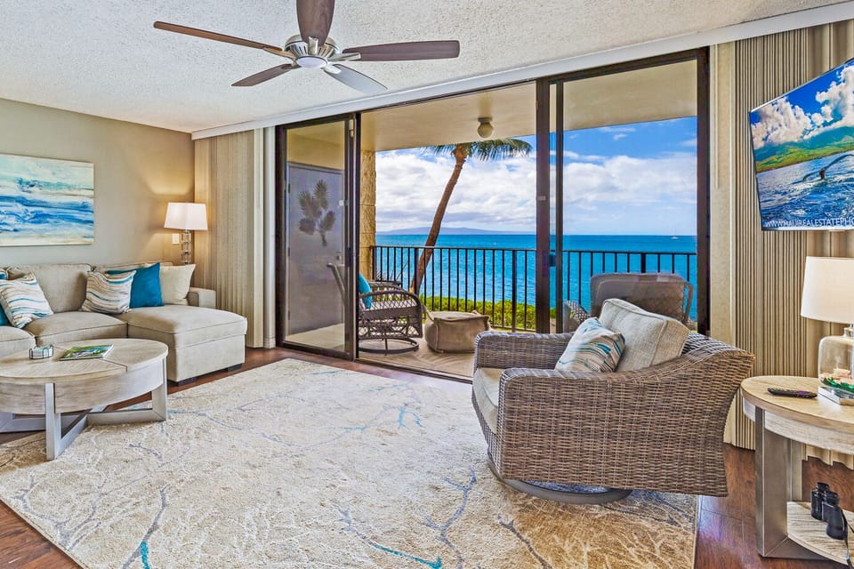 Sit back and enjoy this open airy living room with island decor throughout