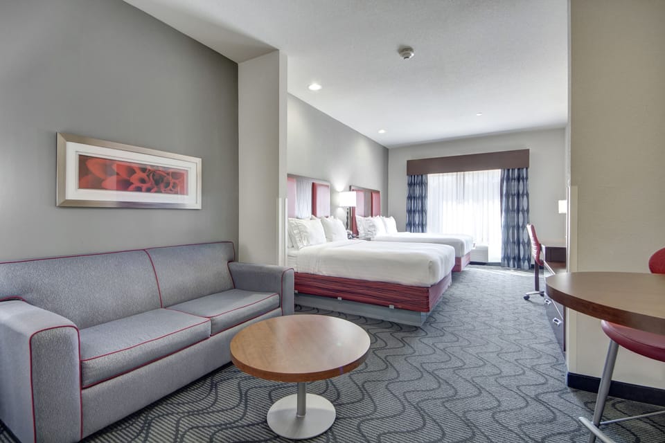 Suite, 2 Queen Beds | Pillowtop beds, desk, iron/ironing board, cribs/infant beds