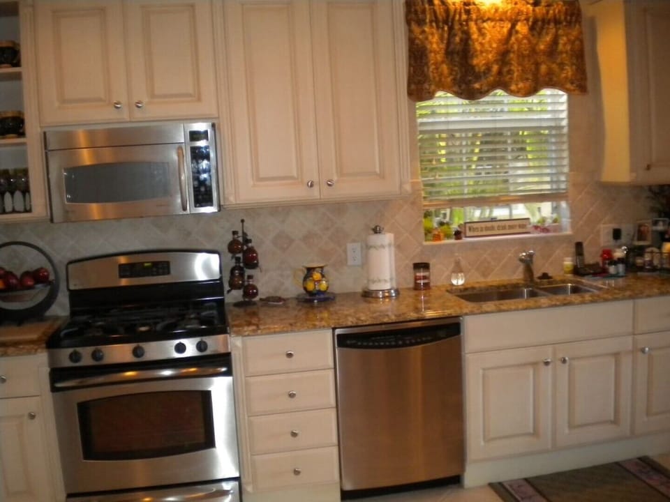 Upgraded Stainless Steel Appliances in Kitchen
