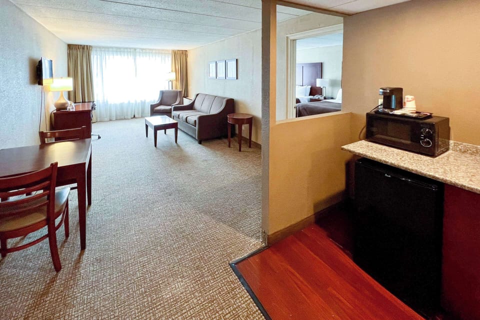 Suite, 2 Queen Beds, Non Smoking | Desk, soundproofing, iron/ironing board, free cribs/infant beds