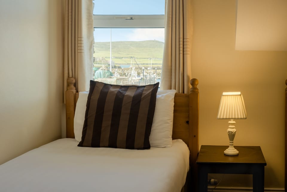 Deluxe Double Room, Sea View | Blackout drapes, iron/ironing board, free WiFi, bed sheets