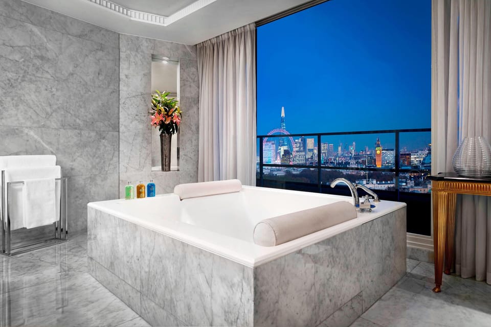 Suite, 2 Bedrooms | Bathroom | Separate tub and shower, eco-friendly toiletries, hair dryer, bathrobes