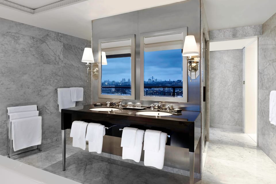 Suite, 2 Bedrooms | Bathroom | Separate tub and shower, eco-friendly toiletries, hair dryer, bathrobes