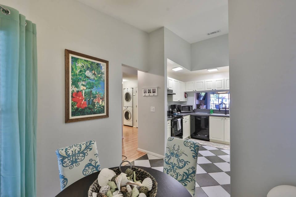 Fully stocked kitchen with its own table and four chairs for that morning breakfast and coffee