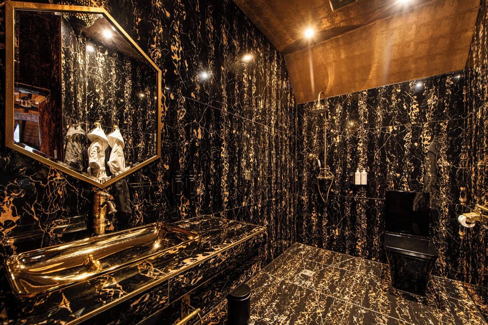 Decadent | Bathroom | Shower, designer toiletries, hair dryer, bathrobes
