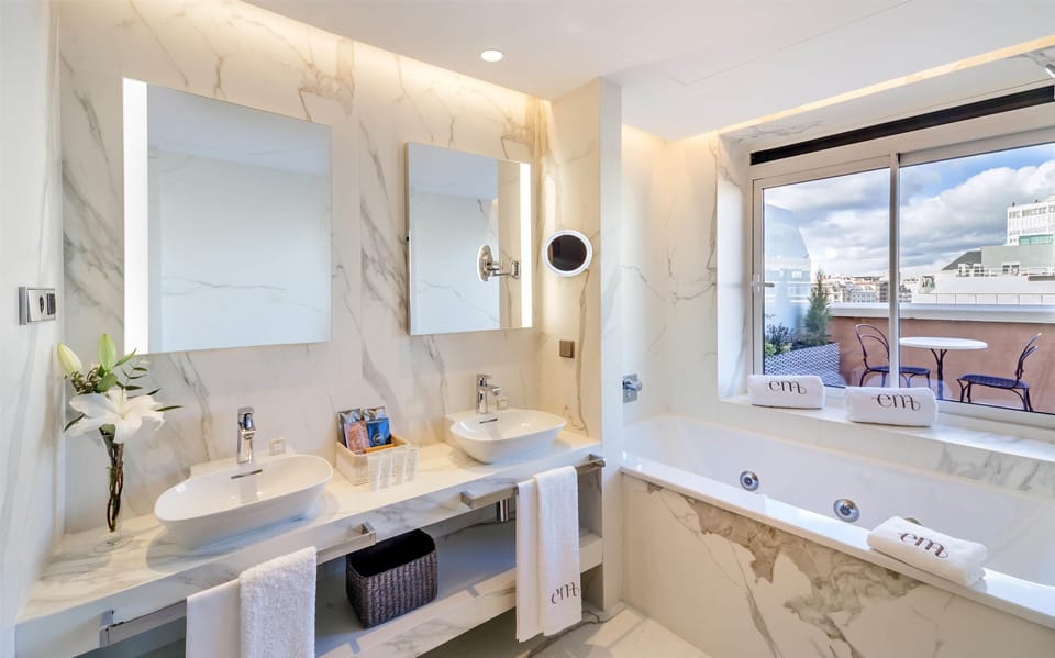 Shower, designer toiletries, slippers, bidet