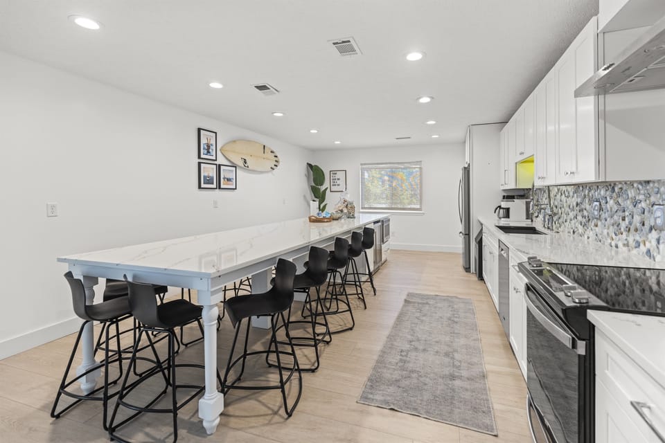 Gather around this spacious communal kitchen where you'll create memories over shared meals and morning coffee together.