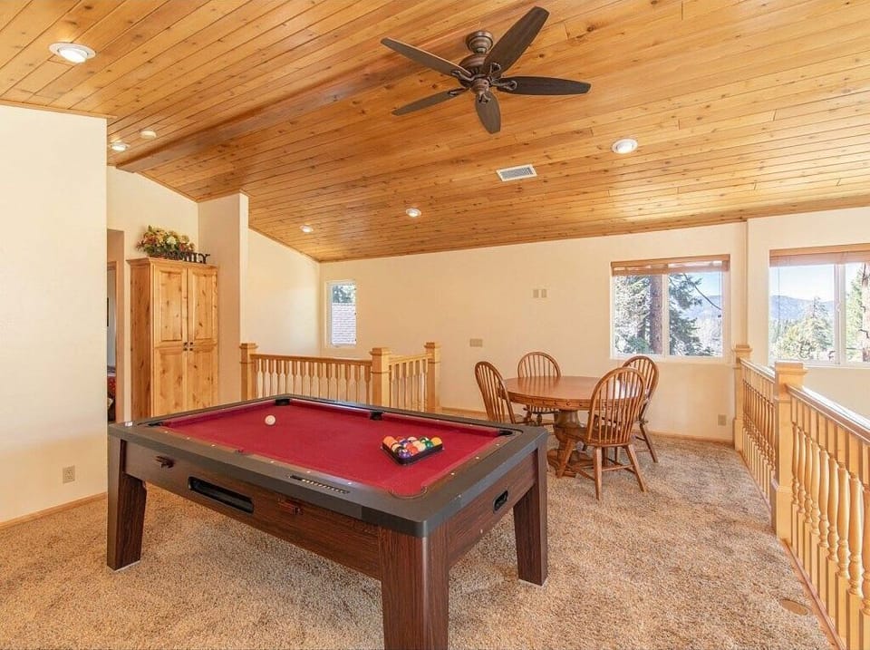 Game room in loft upstairs with pool table and more games to attach the pool table to.