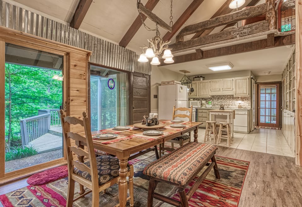 Dine-In with a Creekside View - Enjoy the view from your dining table out the large windows of your Creekside Cabin