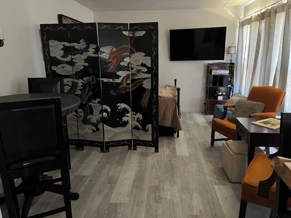 Family Room or Bedroom, Full Day Bed With Single Trundle, and Single Folding Cot