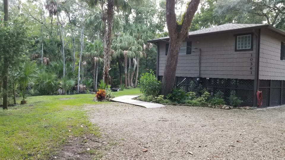 Walkway going around to the front of home.