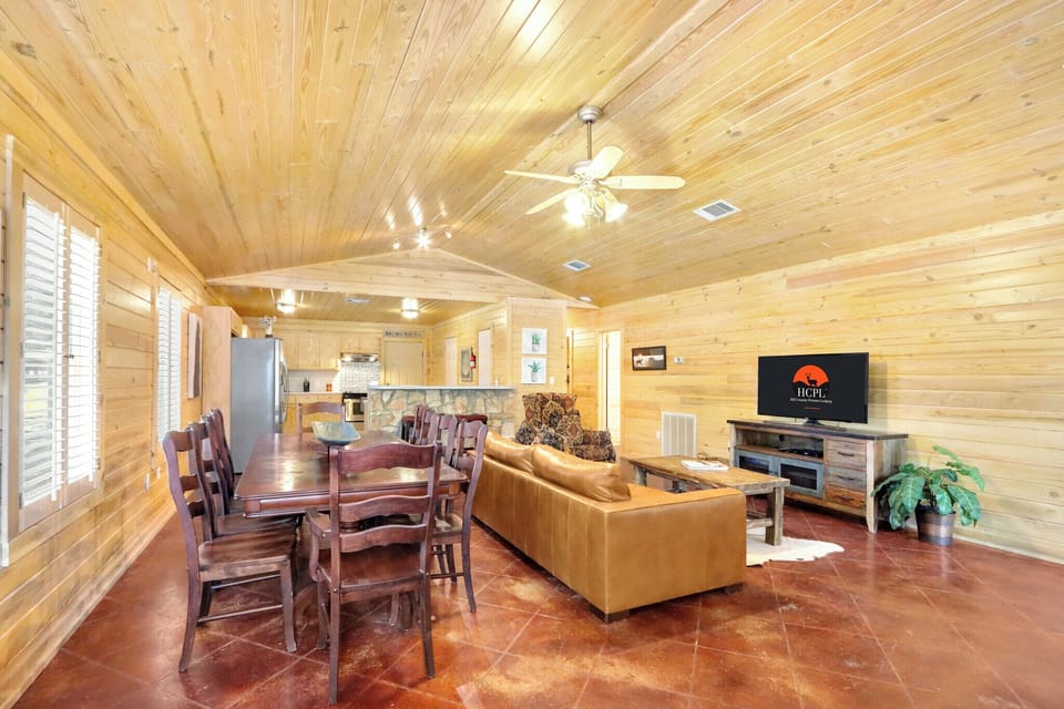 The dining area is behind the living room