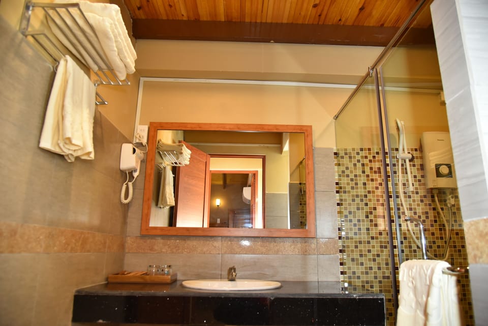 Mekong Villas | Bathroom | Shower, free toiletries, hair dryer (on request), slippers