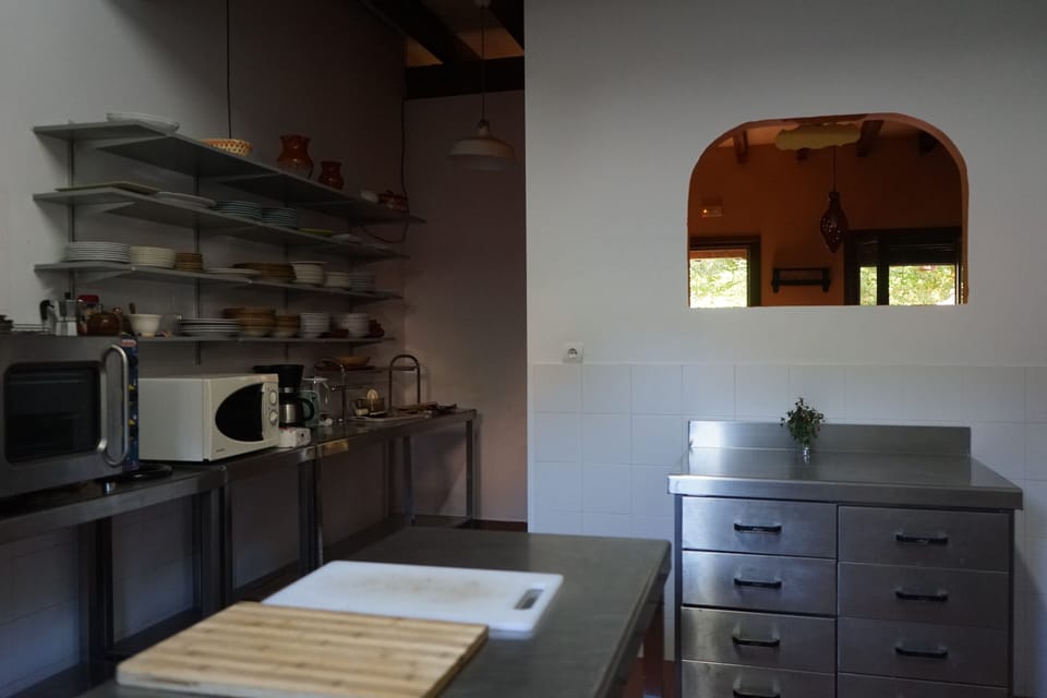 Microwave, oven, coffee/tea maker, cookware/dishes/utensils