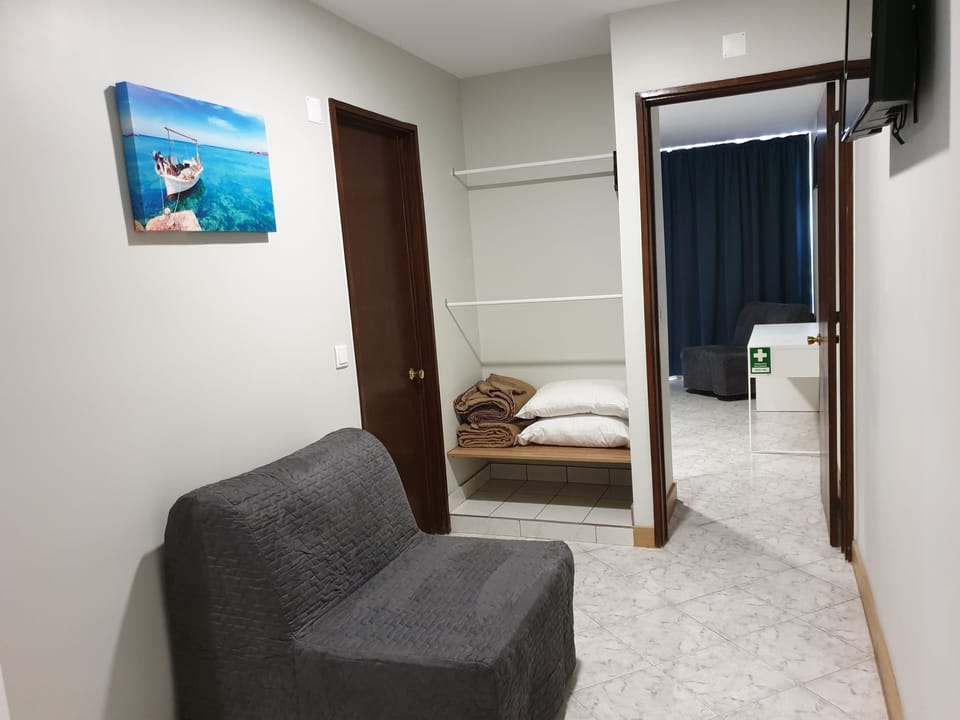 Standard Apartment, 1 Bedroom | Living area | 32-inch flat-screen TV with digital channels, LED TV