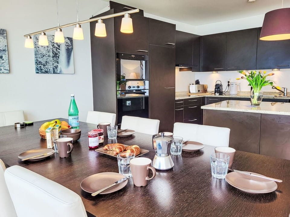 Furniture, Interior Design, Flooring, Countertop, Light Fixture, Chair, Table, Ceiling, Kitchen & Dining Room Table, Kitchen