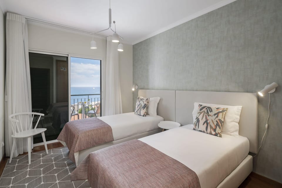 Bedroom with two single beds. 