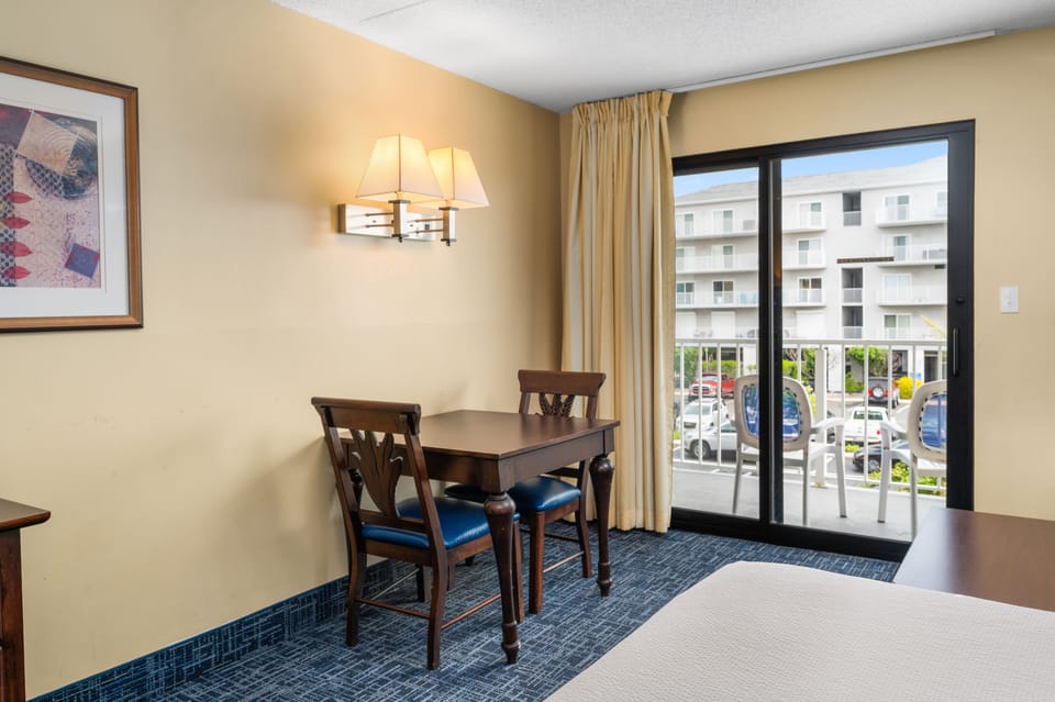 Standard Room, Multiple Beds, City View (No pets allowed) | Blackout drapes, iron/ironing board, free WiFi, bed sheets