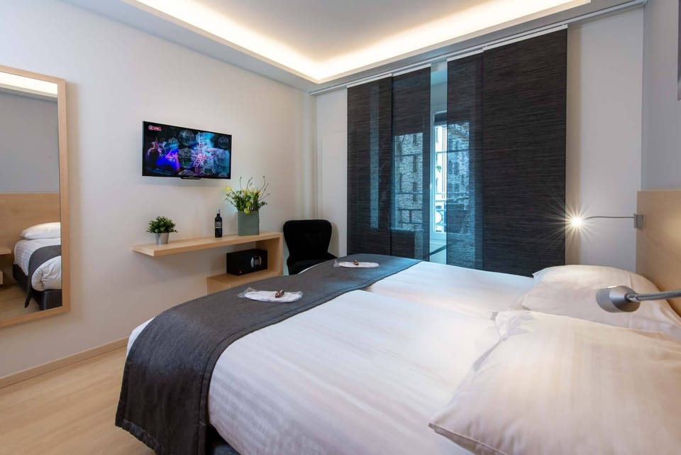 Standard Twin Room, 2 Twin Beds | In-room safe, desk, laptop workspace, blackout drapes