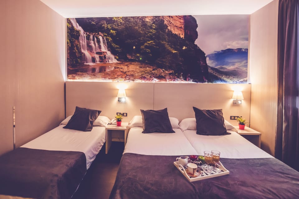 Basic Triple Room, Private Bathroom | In-room safe, iron/ironing board, free WiFi