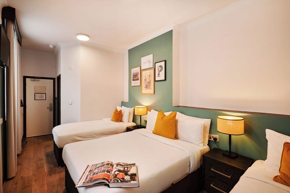 Quadruple Room | Pillowtop beds, iron/ironing board, free WiFi