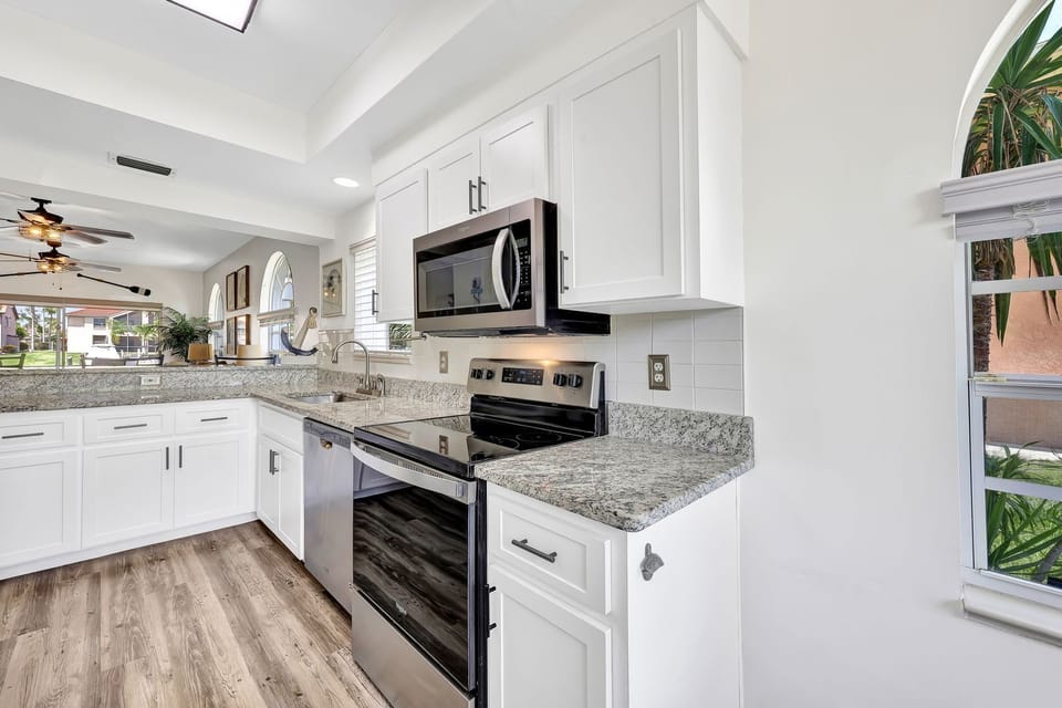 Kitchen remodeled with new appliances in 2022. Full-size appliances.
