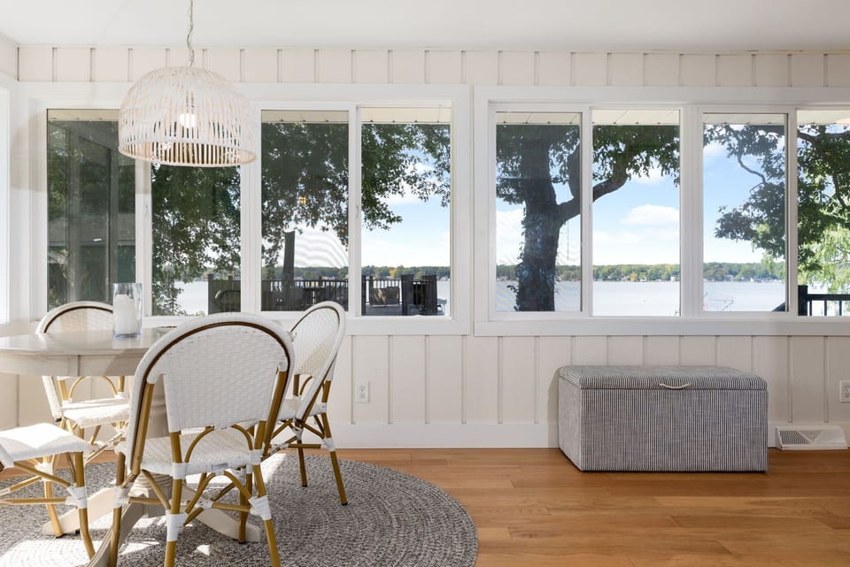 Sun-Drenched Sunroom: The perfect spot to curl up with a book and watch the waves.