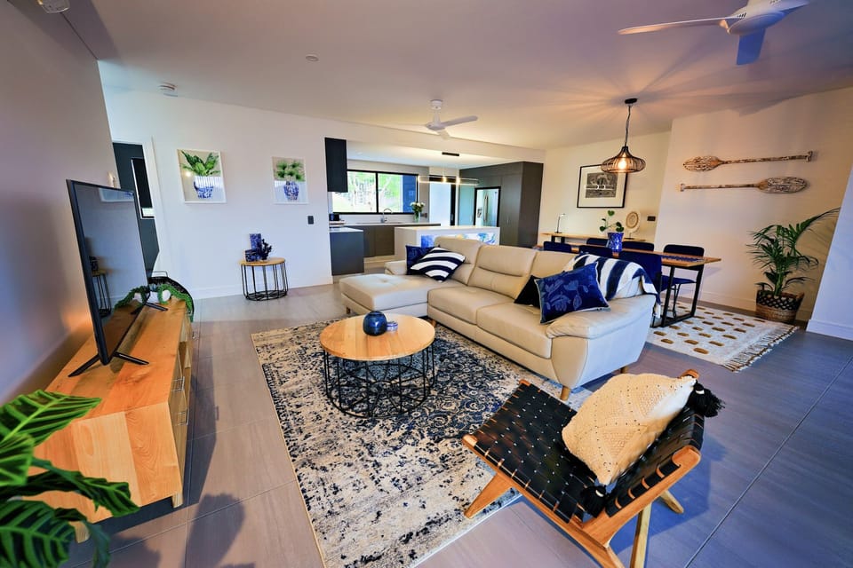 Luxury Room, 3 Bedrooms, 2 Bathrooms | Living area | 55-cm Smart TV with digital channels, TV, iPod dock