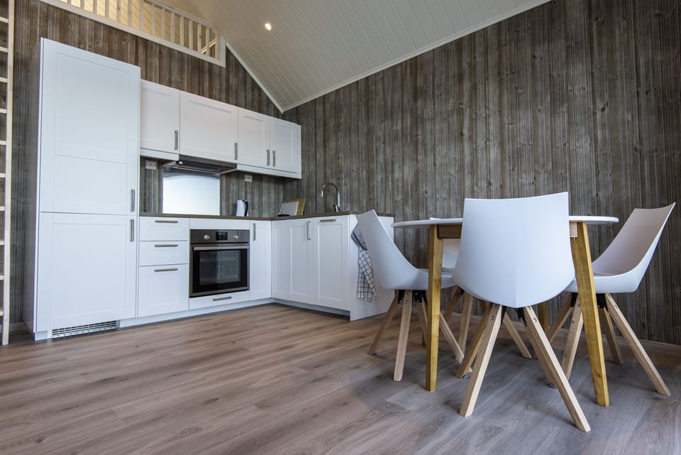 Seaview Rorbu Vega | Private kitchen | Full-size fridge, oven, dishwasher, electric kettle