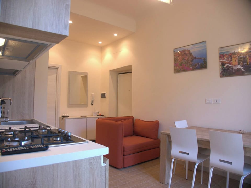 Apartment, 2 Bedrooms, Smoking, Balcony | Living area | Books