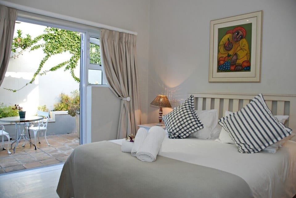 2nd bedroom with patio and en-suite shower.