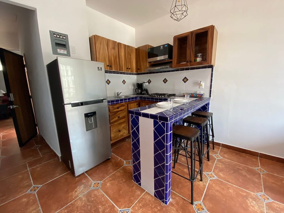 breakfast bar with 3 stools
